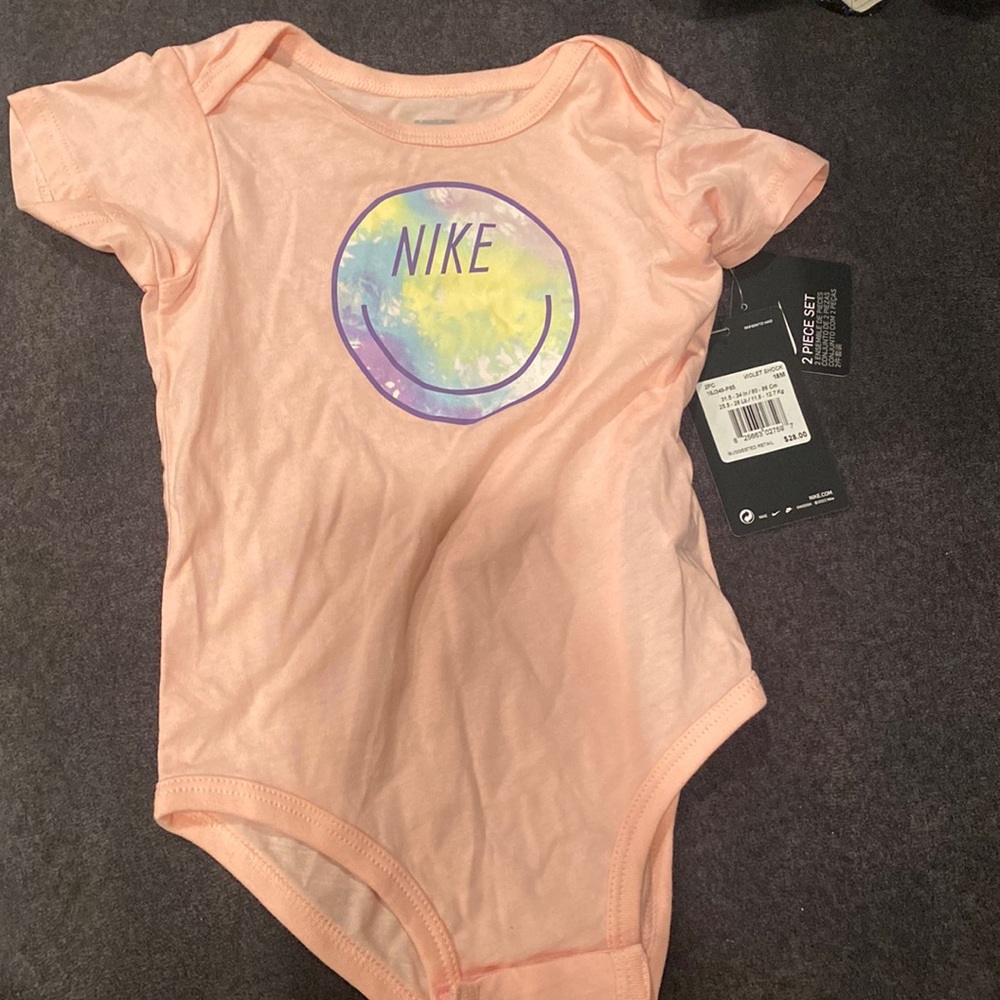 Toddler girl light pink Nike onesie